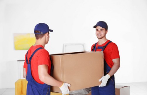 Man and van team preparing equipment for a safe moving job