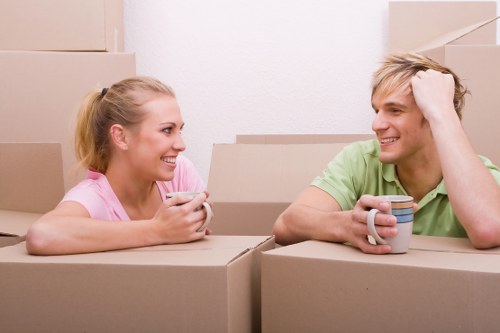 Packed boxes and furniture prepared for a house move in West Hampstead