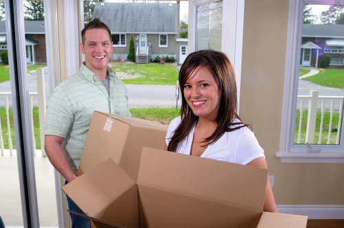 Trained movers using safe handling procedures during a West Hampstead relocation