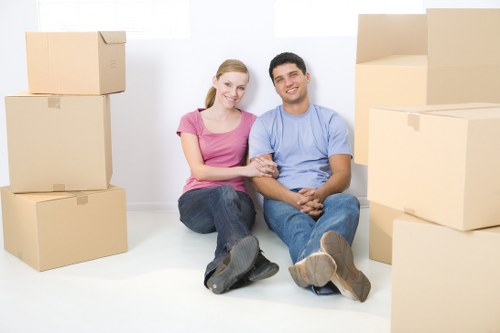 Workers handling furniture carefully during a move