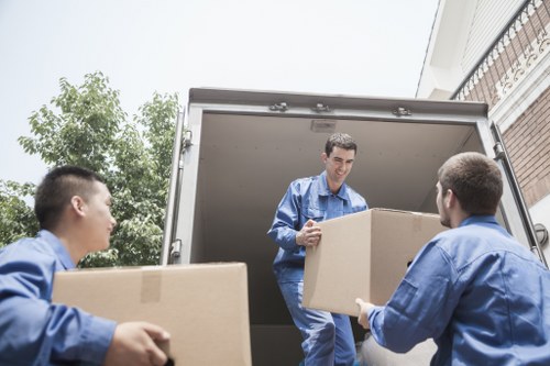 Boxes and furniture being loaded for a West Hampstead relocation