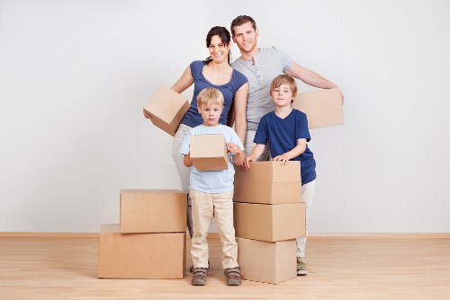 Packed boxes and furniture prepared for a local house move