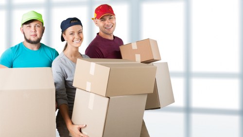 Office relocation equipment and furniture ready for transport