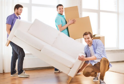 Packing and loading furniture into a removal van