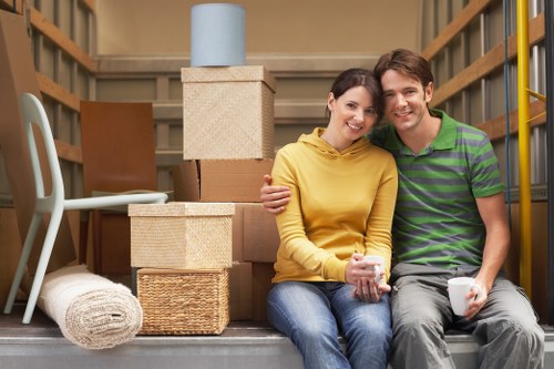 Local packing service preparing fragile items for a move in West Hampstead