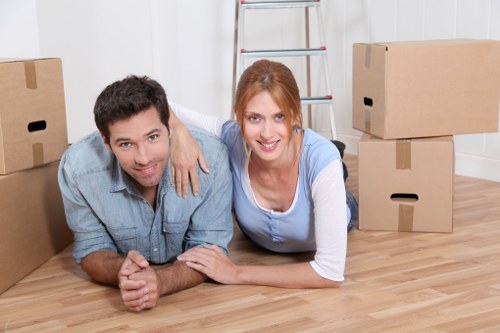 Moving boxes and furniture from a local apartment in West Hampstead