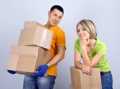 Removal crew loading household items for a West Hampstead home relocation